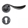 2057 Circular Wrought Iron Door Lever Handle on Rose Lorenz Ferart
